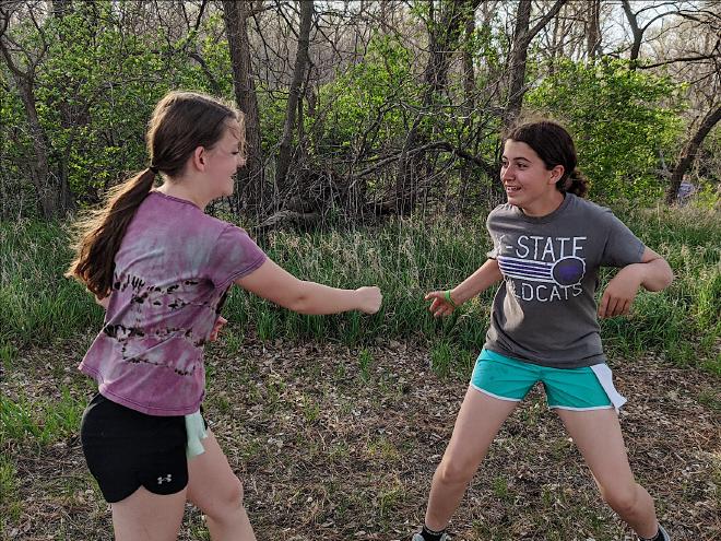 Josie and Maddie facing off during capture the flag!